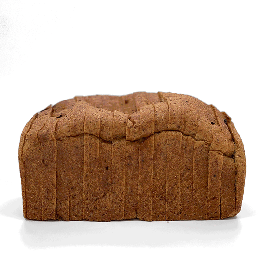 Picture - A low carb fruity loaf of bread against a white background. 