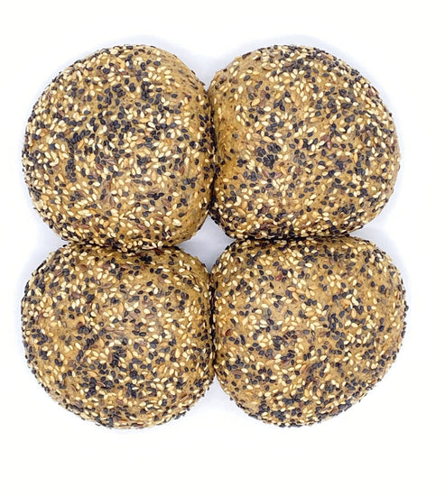 Picture - Four diabetic friendly seeded rolls on a plain white background. 